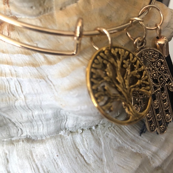 Adjustable gold tone bracelet w/tassel, tree,hamsa - Picture 3 of 3